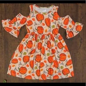 Cold shoulder pumpkin dress